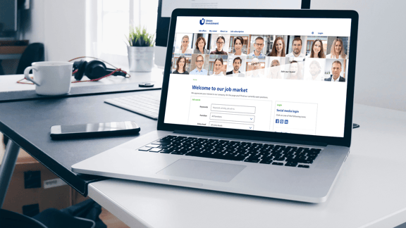 A laptop shows the Union Investment careers page with a smiling woman and a search field for job advertisements - a symbolic image for a reference to the successful use of the beesite.